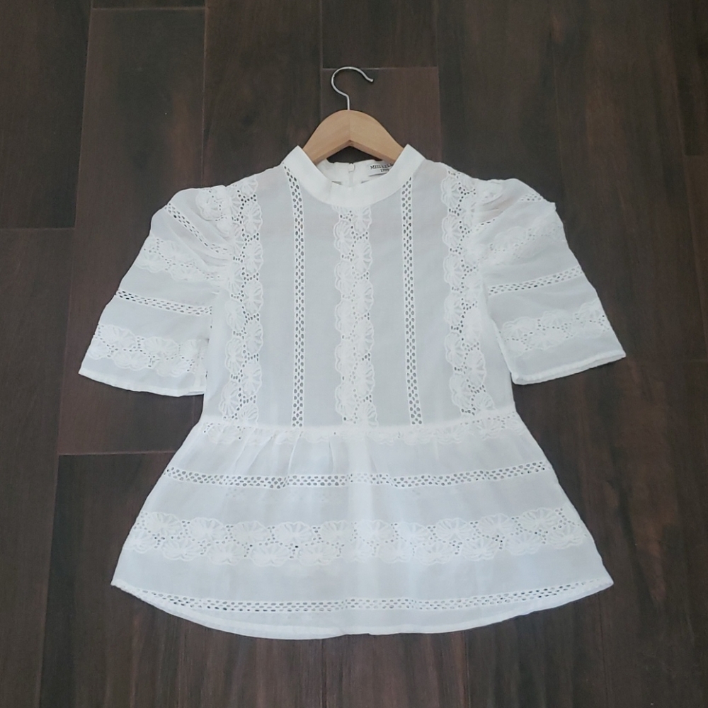 White embroidery blouse.